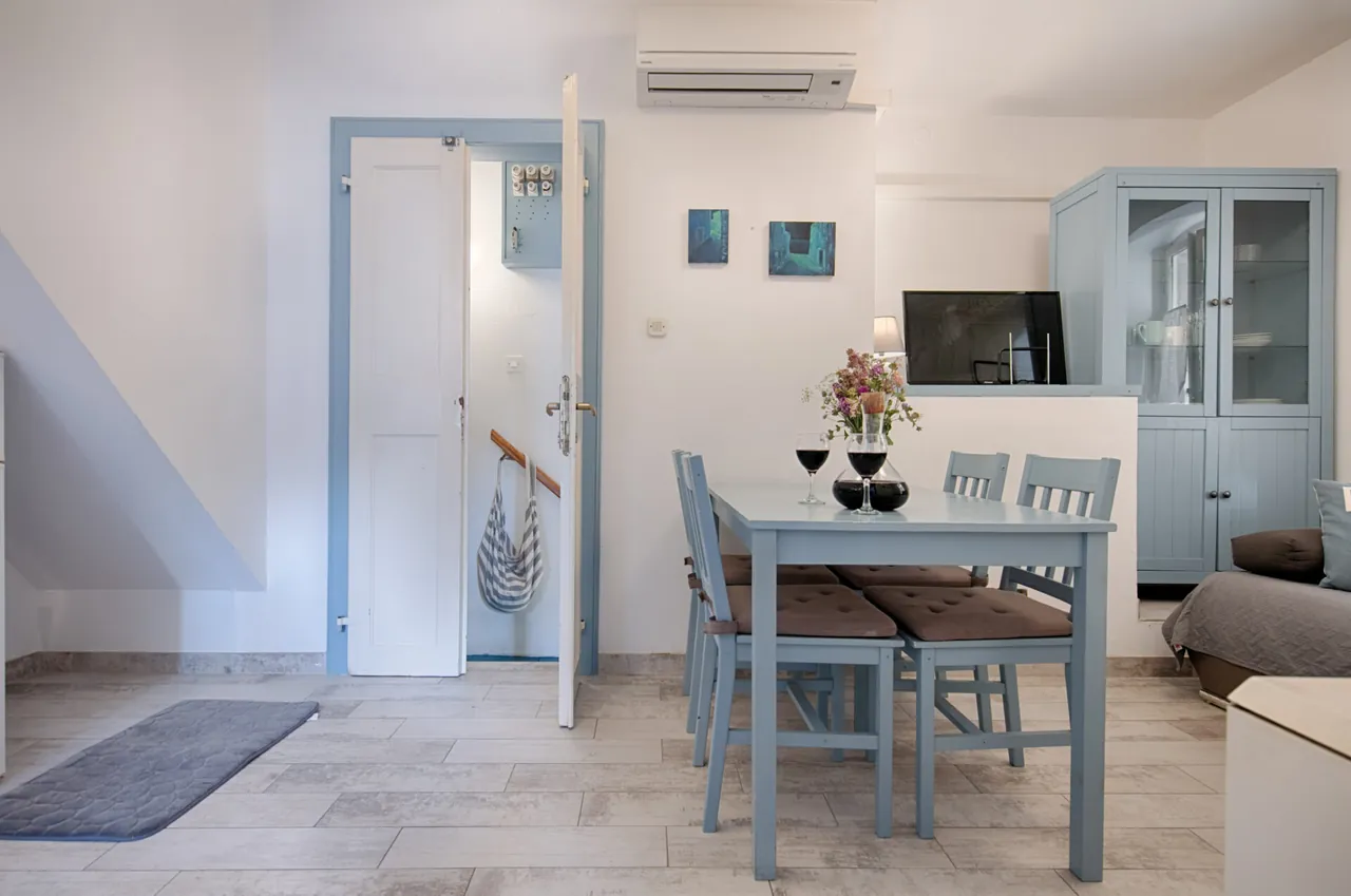 Dining table and blue cabinet, Nona Antonija apartment, Komiža