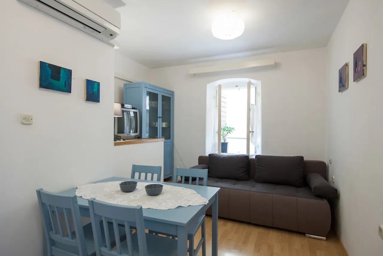 The sofa and the dining table, Nona Antonija apartment, Komiža