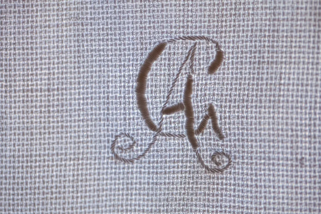 A monogram embroidered on linen, Nono Andre apartment, Komiža